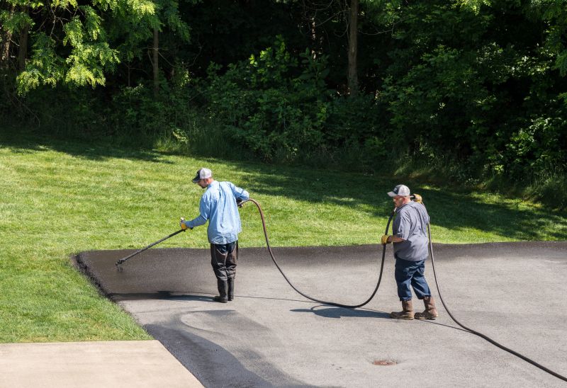 Local Driveway Sealing pros at work